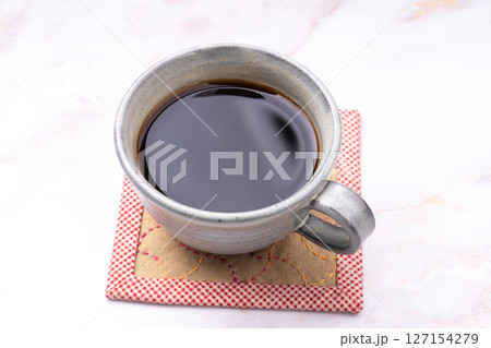 刺し子コースターとコーヒー 127154279