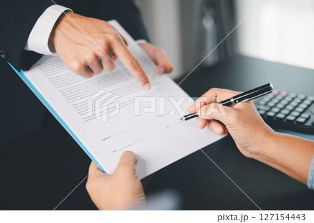 Business people signing contract making deal with life insurance agent Concept for consultant health insurance life insurance savings plan. Approved stamp with Business people contract making deal Business people signing contract making deal with life insurance agent Concept for consultant health insurance life insurance savings plan. Approved stamp with Business people contract making deal 127154443