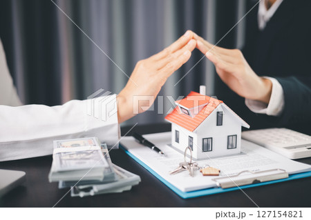 Concept business house finance protection office plan investment buy sell home ensuring idea financial security. residence agent hand protect purchase insurance and secure favorable loan deal. Concept business house finance protection office plan investment buy sell home ensuring idea financial security. residence agent hand protect purchase insurance and secure favorable loan deal. 127154821