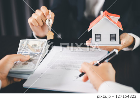 Concept business house finance protection office plan investment buy sell home ensuring idea financial security. residence agent hand protect purchase insurance and secure favorable loan deal. 127154822