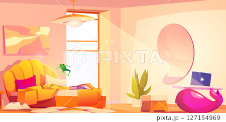 Green frog jumps on cozy bedroom bed 127154969