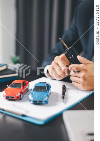 Concept business vehicle finance protection office plan investment buy sell car ensuring idea financial security. automobile agent hand protect purchase insurance and secure favorable loan deal. 127155110