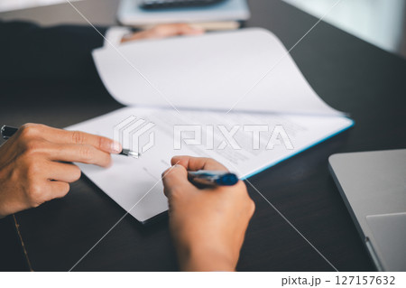 Business people signing contract making deal with life insurance agent Concept for consultant health insurance life insurance savings plan. Approved stamp with Business people contract making deal Business people signing contract making deal with life insurance agent Concept for consultant health insurance life insurance savings plan. Approved stamp with Business people contract making deal 127157632