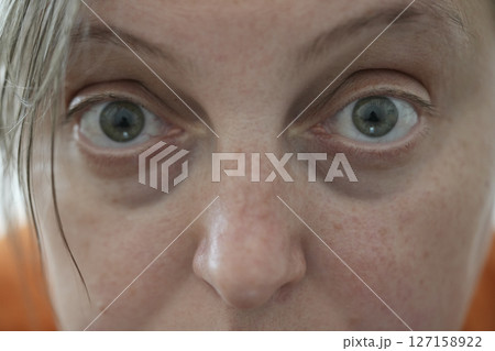 young woman's eyes 127158922