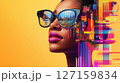 Woman looking confidently to the side while wearing trendy sunglasses reflecting a colorful city skyline. Bright yellow background creates a bold artistic vibe 127159834