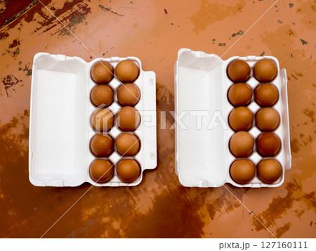Chicken Eggs in a plastic tray. 127160111