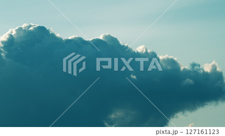 Dramatic Cloud Formation Captured in Soft and Beautiful Light, Showcasing Natures Artistry 127161123