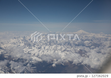 Landscape on the tops of the mountains of the Caucasus from an airplane elluminator 127162029