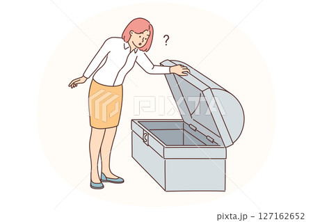 Businesswoman look in empty treasury chest 127162652