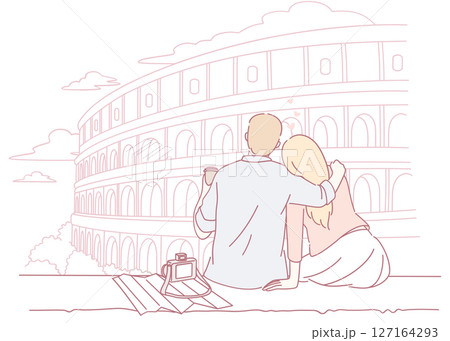 A Couple Enjoying a Beautiful and Romantic Moment Together at the Iconic Colosseum in Rome 127164293