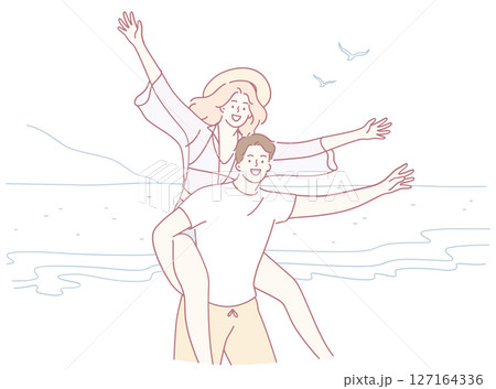 Enjoying a Joyful Beach Day with Closest Friends in a Wonderful Playful Moment Together 127164336