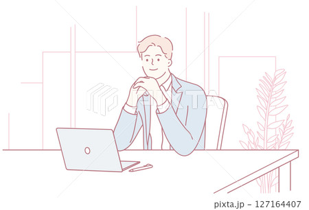 A confident professional at work, engaged with a laptop, showing career dedication and expertise 127164407