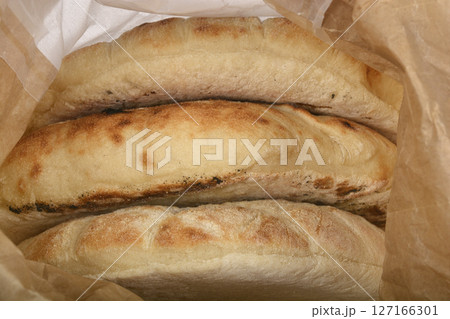 Freshly baked flatbreads Freshly baked flatbreads 127166301