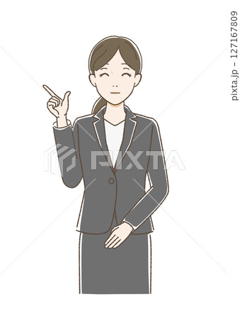 正面をむいて指をさし微笑む女性 127167809