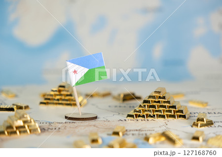 Djibouti flag on a world map with stacked golden bars, symbolizing national wealth, economic resources, global investment, trade, and strategic financial potential 127168760