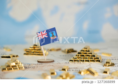 Montserrat flag prominently displayed on a global map, surrounded by shining gold bars, representing international financial investment, national economic stability, and wealth management Montserrat flag prominently displayed on a global map, surrounded by shining gold bars, representing international financial investment, national economic stability, and wealth management 127168899