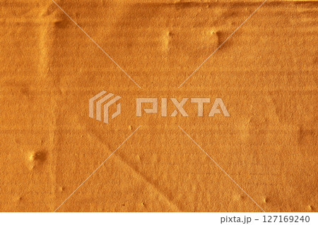 Brown Carton box packaging paper with bump and line creases texture macro closeup Brown Carton box packaging paper with bump and line creases texture macro closeup 127169240
