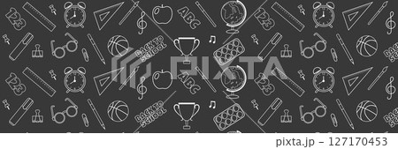 Seamless repeating pattern of school supplies on dark background. Chalk drawings on school board. 127170453