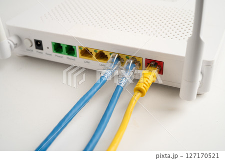 Ethernet cable with wireless router connect to internet service provider network. 127170521