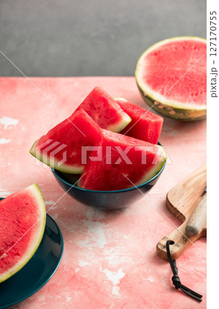 Slices of fresh watermelon in a bowl 127170755