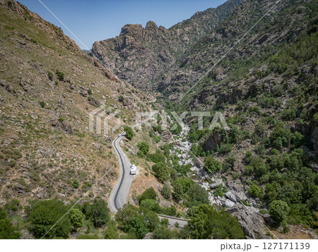 Camping Caravan driving through Canyon de la Ruda road Corsica down the pass monte Cino Camping Caravan driving through Canyon de la Ruda road Corsica down the pass monte Cino 127171139