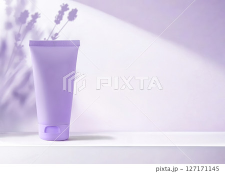 Lavender moisturizer tube against a purple backdrop 127171145