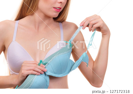 Woman choosing underwired bra 127172318