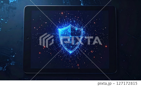 Digital Shield Security Protection Technology Concept Showing Cybersecurity Defense on a Tablet Screen with Bright Blue Shield Icon and Data Particles 127172815