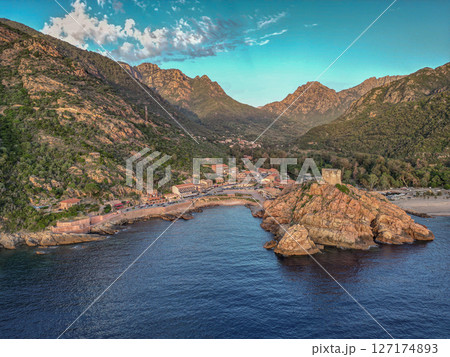 Aerial view town ruins Genoese tower of Porto Corsica France medieval watchtower Mediterranean Sea Calanches de Piana Aerial view town ruins Genoese tower of Porto Corsica France medieval watchtower Mediterranean Sea Calanches de Piana 127174893