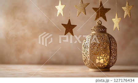 Ornate Lantern Surrounded by Hanging Stars in Warm Glow 127176434
