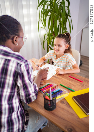 Engaging creativity between a mentor and a young artist 127177018