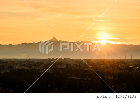 Incredible sunset over Turin city with snowy Alps mountains Incredible sunset over Turin city with snowy Alps mountains 127178135