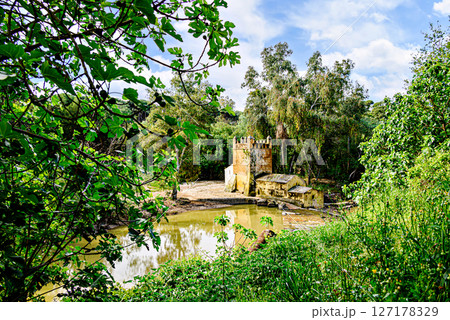 Algarrobo flour mill next to the banks of the Guadaira River, within Oromana Park in Alcala de Guadaira, Seville	 127178329
