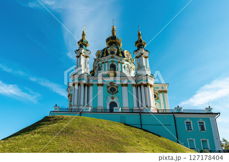 St. Andrews Church in Kyiv, baroque landmark on green hill, Ukraine 127178404