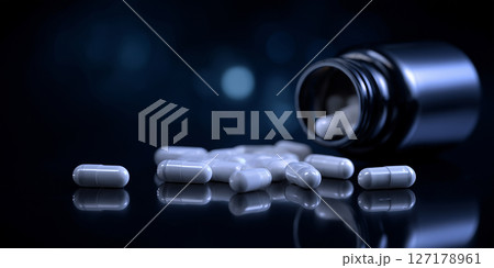 Toppled bottle with capsules indicating risk of unsupervised medication Toppled bottle with capsules indicating risk of unsupervised medication 127178961