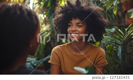 Joyful Conversation Amidst Lush Greenery 127181435