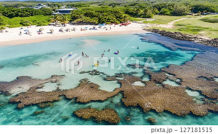 Aerial View of Tropical Beach with Turquoise Water and Coral Ree 127181515
