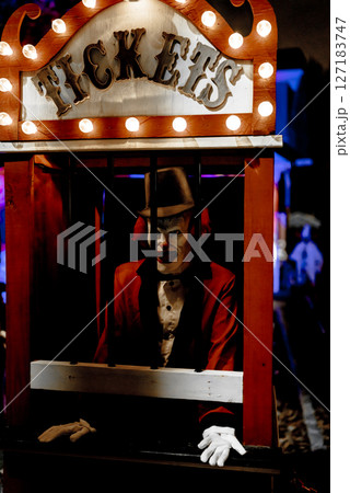 Haunted Carnival Yard with Scary Clowns and Halloween Decorations 127183747