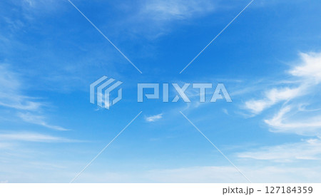 sky is blue and clear with  clouds 127184359