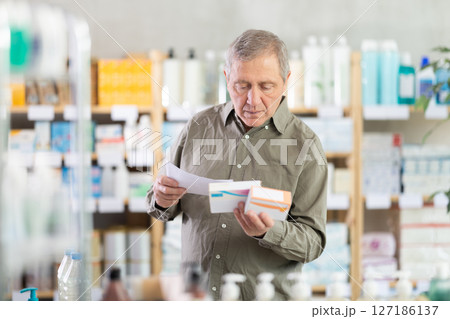 Elderly Man With Medical Prescription And Pills 127186137