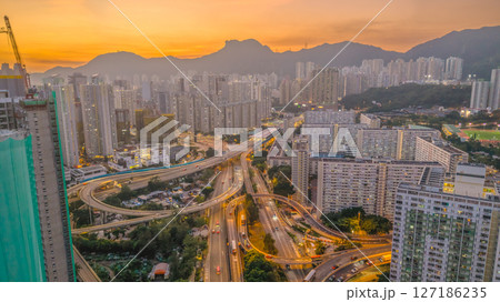June 6 2025 Urban Cityscape at Sunset with Skyscrapers and Mountainous 127186235