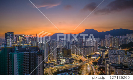 June 6 2025 Night Cityscape Featuring Illuminated Streets and Towering Skyscrapers 127186260