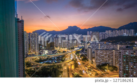June 6 2025 Night Cityscape Featuring Illuminated Streets and Towering Skyscrapers 127186261