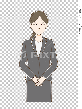 一位身著西裝、面帶微笑的女士面朝前方 127186338