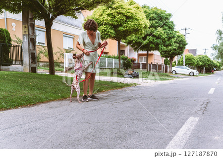 Teen girl spending time with her beloved pet 127187870