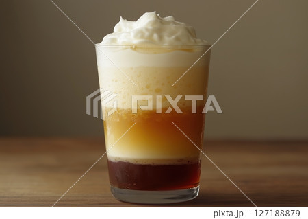 Layered Coffee with Cream in Glass on Wooden Table, Perfect for Coffeehouse Menus 127188879
