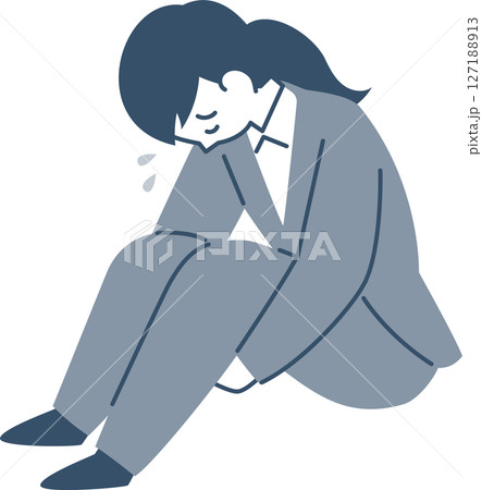 うなだれて座り込むスーツ姿の若い女性 127188913