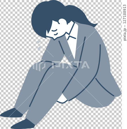 うなだれて座り込むスーツ姿の若い女性 127188913