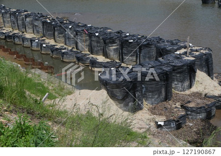 護岸の復旧工事 127190867