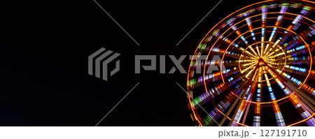 Colorful Ferris Wheel Lights at Night banner background Colorful Ferris Wheel Lights at Night banner background 127191710